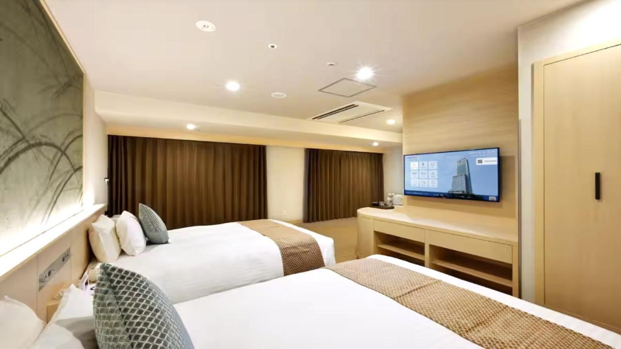 איזומי-סנו Odysis Suites Osaka Airport Hotel מראה חיצוני תמונה
